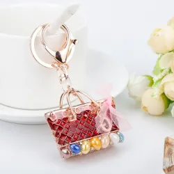 Crystal bag - gold keychainHobbies & Collections