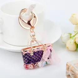 Crystal bag - gold keychainHobbies & Collections