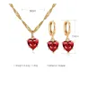 Golden necklace & earrings set with red heartNecklaces