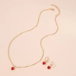 Golden necklace & earrings set with red heartNecklaces