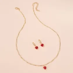 Golden necklace & earrings set with red heartNecklaces