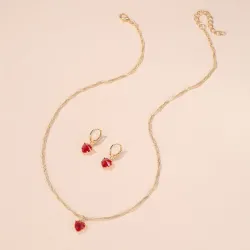 Golden necklace & earrings set with red heartNecklaces