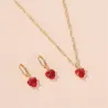 Golden necklace & earrings set with red heartNecklaces