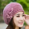 Knitted beret - a warm fur hat with decorative flowersHats & Caps