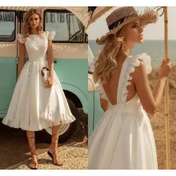 Satin white dress - knee length - sleeveless - open back - with rufflesDresses