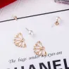 Flower shaped stud earrings - with crystals / pearlsEarrings