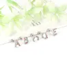 Elegant small stud earrings - with colorful rhinestones - alphabet lettersEarrings
