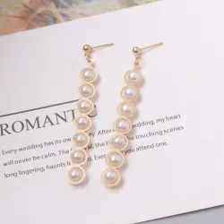 Elegant long golden earrings - geometric metal with pearlsEarrings