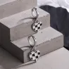 Round earrings with hanging check heartEarrings