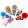 Crystal teddy bear with fur pom pom - keychainKeyrings