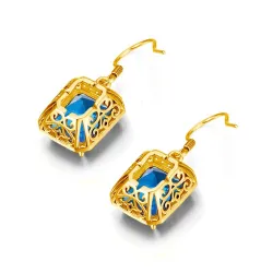 Golden earrings with blue crystal topaz / rhinestonesEarrings