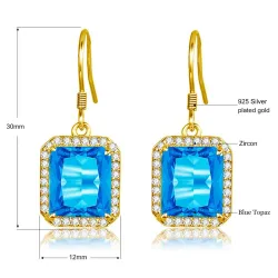 Golden earrings with blue crystal topaz / rhinestonesEarrings