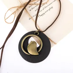 Wooden pendant with bird - rope necklaceNecklaces