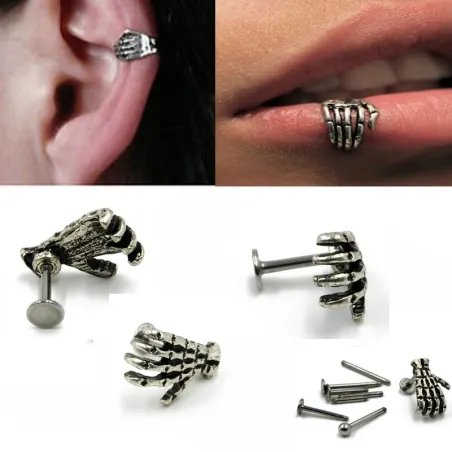 Body piercing with skull handEarrings